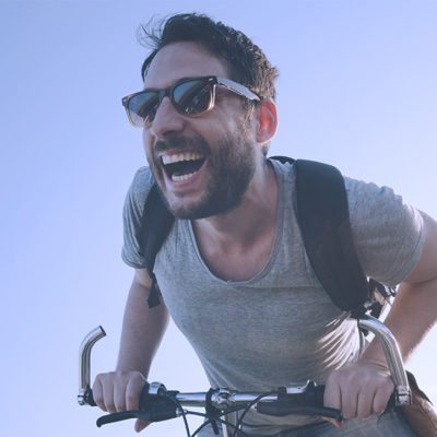 Guy on a Bike Smiling