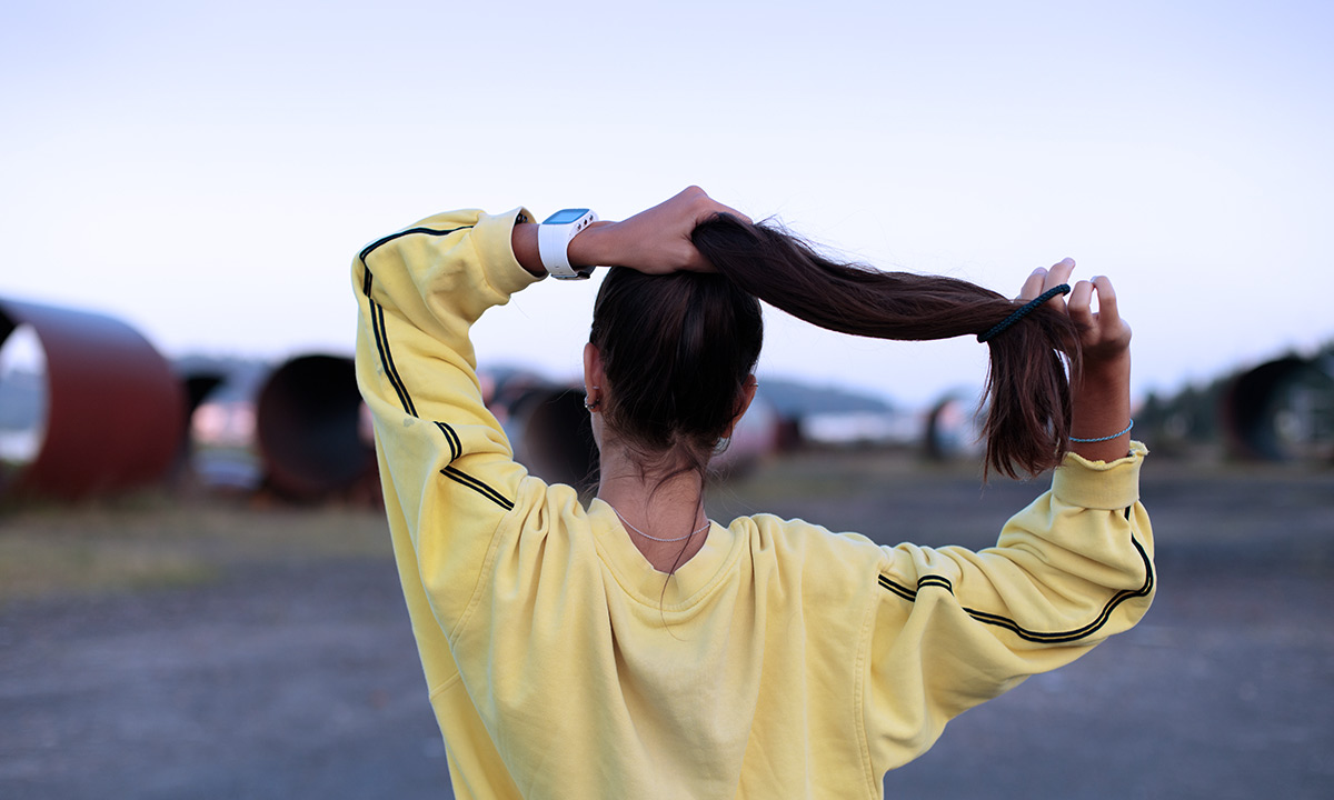 Girl Holding her Ponytail