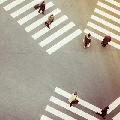 Crosswalks converge in a busy street