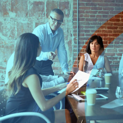 A team discusses how to scale their business model.