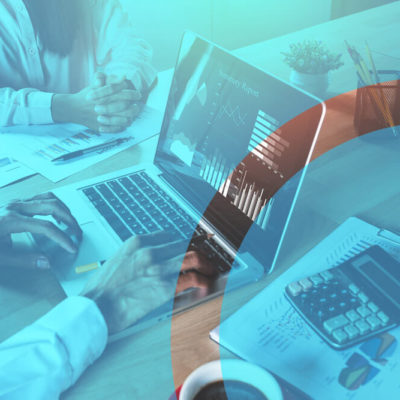 Users review website metricks for success on a laptop.
