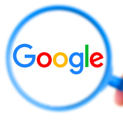 Monocle with Google in the background