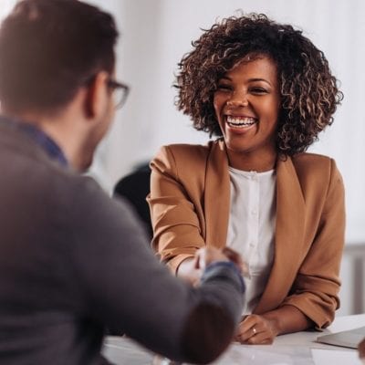 Business people shaking hands after meeting