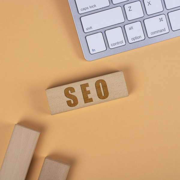 SEO (Search Engine Optimization) Abbreviation on wood block.