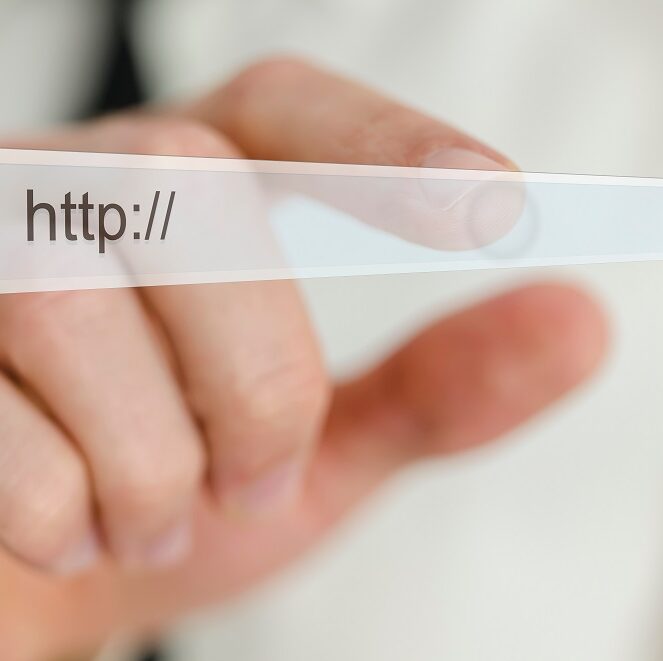 Search bar on virtual screen Business man hand pointing at search bar on virtual screen.